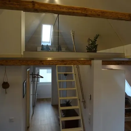 Апартаменты Schickes Dachgeschossloft